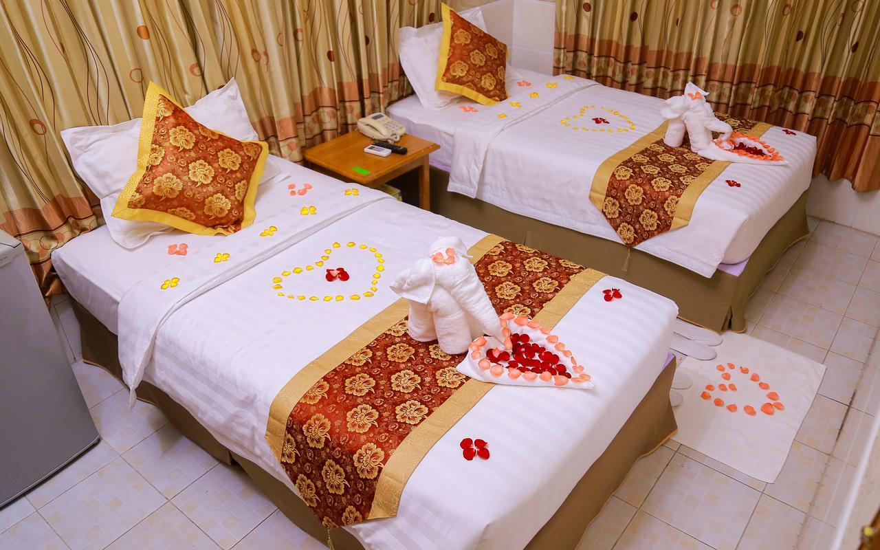 Hotel Shwe Pyi Tan Mandalay Extérieur photo